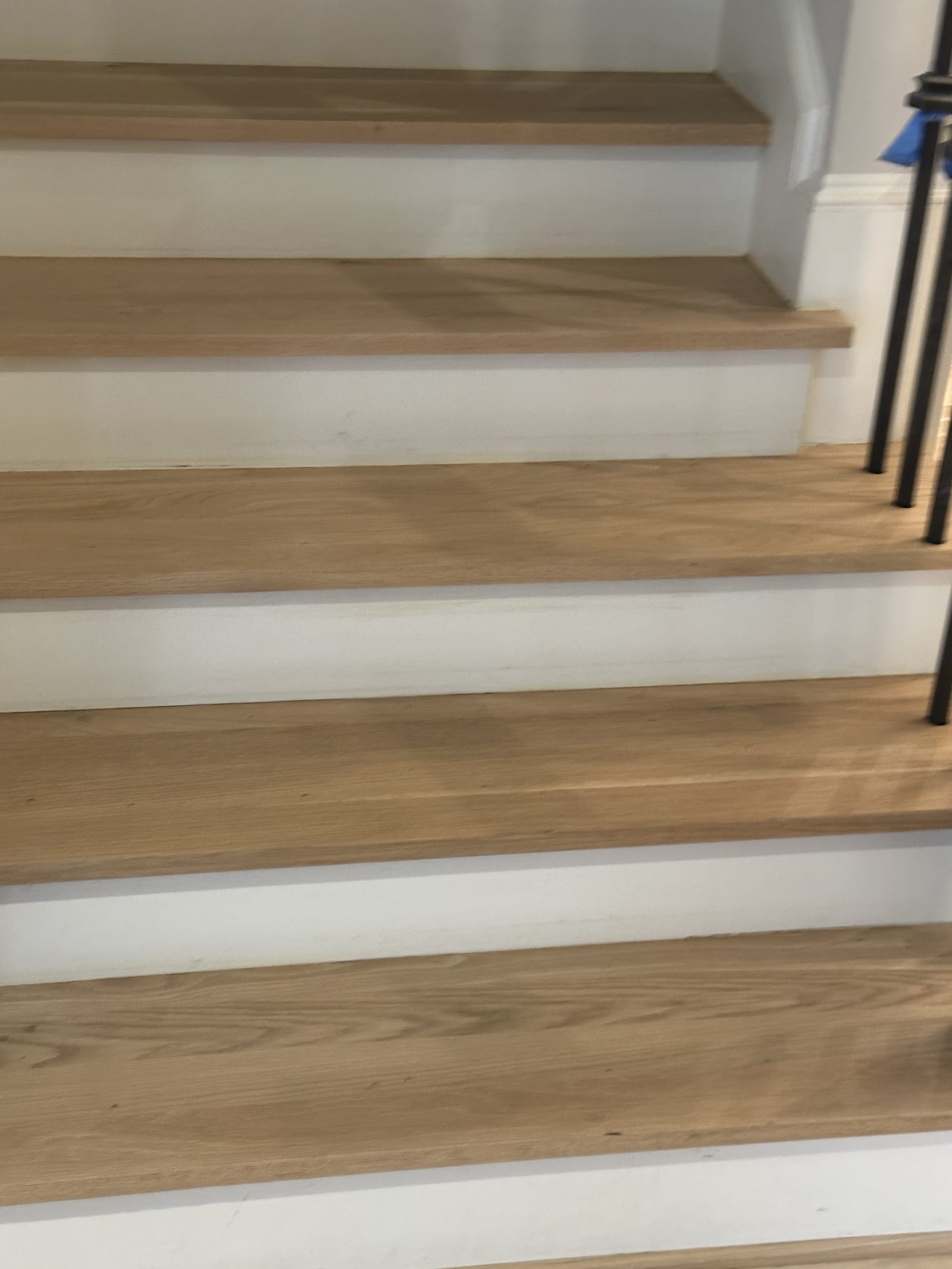 Fresh stair treads mid-install